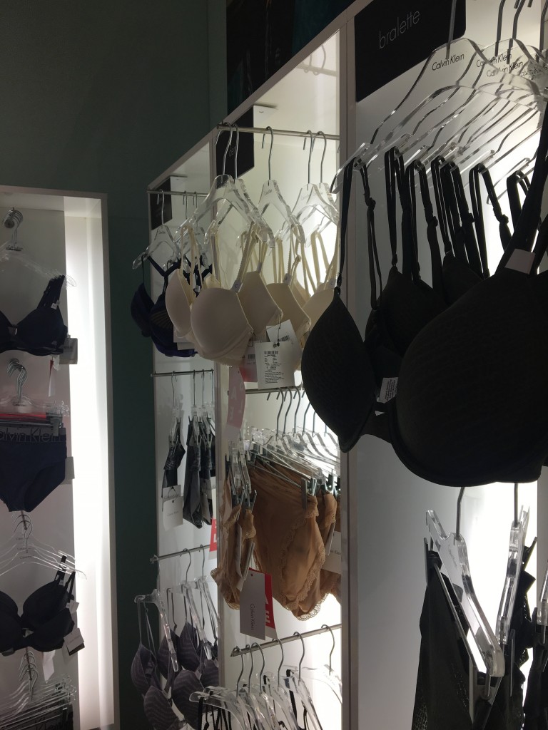 Bra & Panties Hanging on display racks on the wall hanger rack lingerie store Calvein Klein Store Infinity Malad