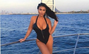 LACY TALES - Lauren Goodger shows off her curves in a risqué swimsuit - 2