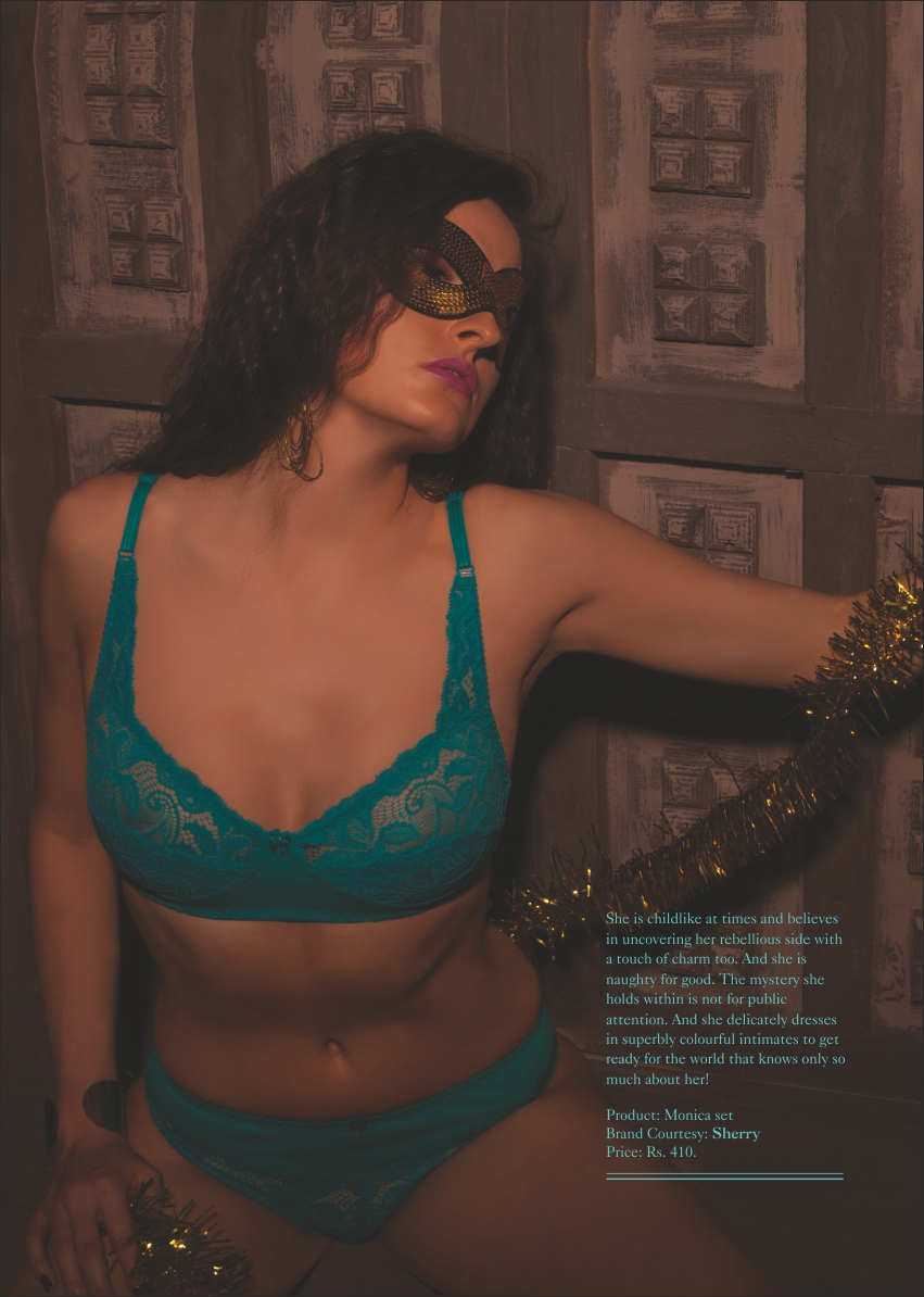 A Modal in Green Lingerie Poses for Masquerade theme