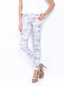 A Model wearing White Top and Vero Moda grey Printed Poly Stretch Leggings