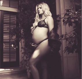 Khloe Kardashian flaunting her baby bump