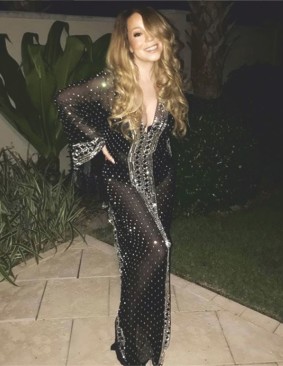 mariah carey wows everyone in a shimmery black lingerie