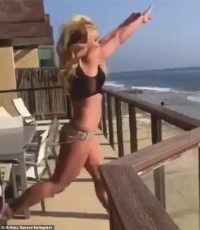 britney spears wears lingerie while performing ballet move at a beach house