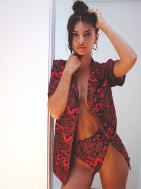 Emily Ratajkowski looks alluring while posing in a red lingerie set